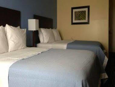 Days Inn & Suites By Wyndham Ozone Park/Jfk Airport Нью-Йорк Экстерьер фото